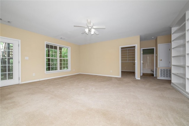124 Bluestone Ct, Easley, SC 29642 - unfurnished living room with light carpet, a ceiling fan, and healthy amount of natural light