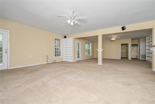 124 Bluestone Ct, Easley, SC 29642 - unfurnished living room featuring ceiling fan and light colored carpet