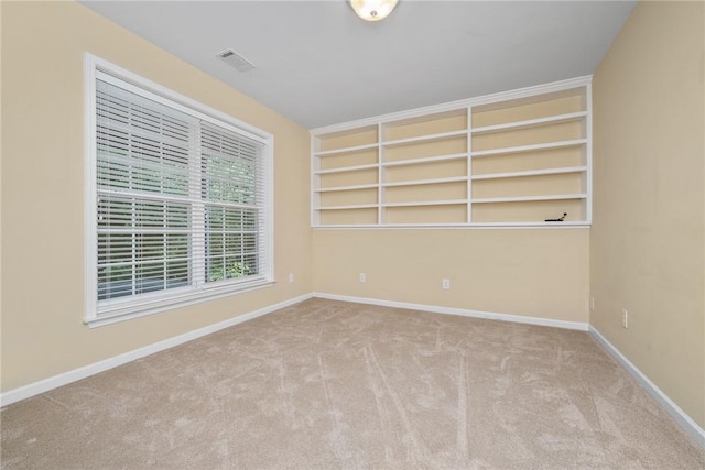 124 Bluestone Ct, Easley, SC 29642 - carpeted empty room with baseboards and built in features