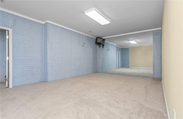 124 Bluestone Ct, Easley, SC 29642 - unfurnished room featuring brick wall and carpet