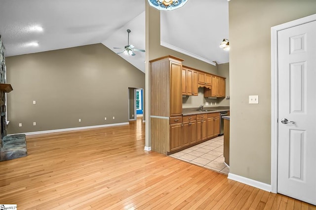 1298 Moorehead Pl, Pendleton, SC 29670 - kitchen featuring ceiling fan, lofted ceiling, light wood-style floors, dishwasher, and open floor plan