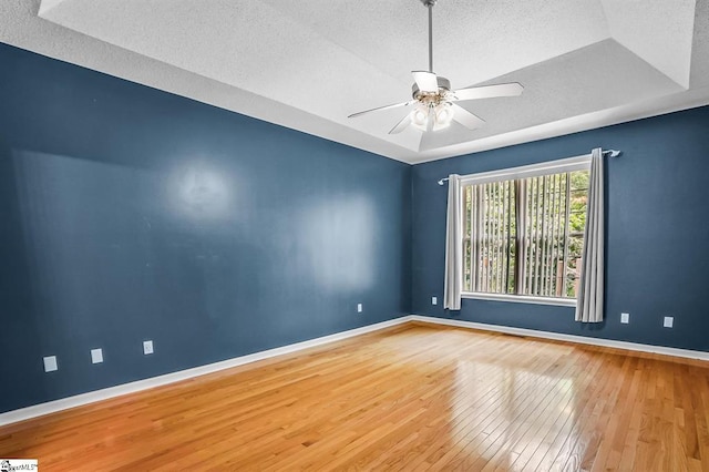 1298 Moorehead Pl, Pendleton, SC 29670 - empty room with a textured ceiling, wood-type flooring, and a ceiling fan