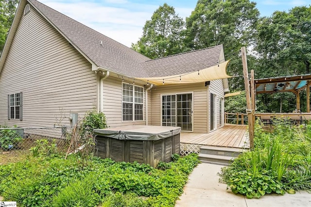 1298 Moorehead Pl, Pendleton, SC 29670 - back of house featuring a hot tub, a deck, and a shingled roof