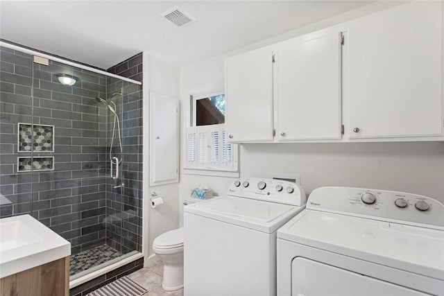 275 Lakeside Dr, Mountain Rest, SC 29664 - laundry room with washing machine and clothes dryer and light tile patterned floors