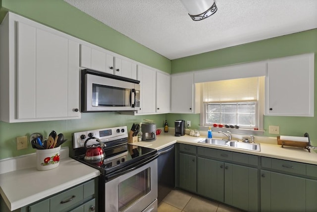 118 Nonna Ln, Seneca, SC 29678 - kitchen featuring appliances with stainless steel finishes, light countertops, a textured ceiling, and white cabinets