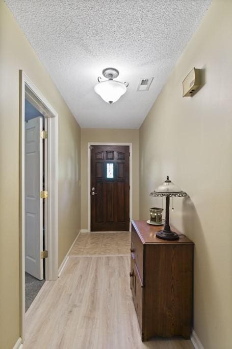 118 Nonna Ln, Seneca, SC 29678 - entryway with light wood finished floors and a textured ceiling