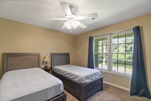 118 Nonna Ln, Seneca, SC 29678 - bedroom with carpet, a textured ceiling, and a ceiling fan