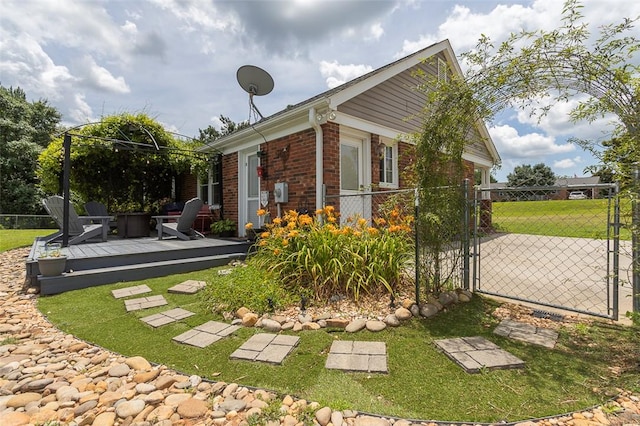 412 Singleton Rd, Anderson, SC 29625 - view of home's exterior with a deck, a gate, and brick siding