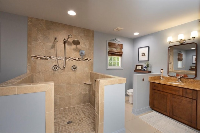 412 Singleton Rd, Anderson, SC 29625 - bathroom featuring a walk in shower, vanity, tile patterned flooring, and recessed lighting