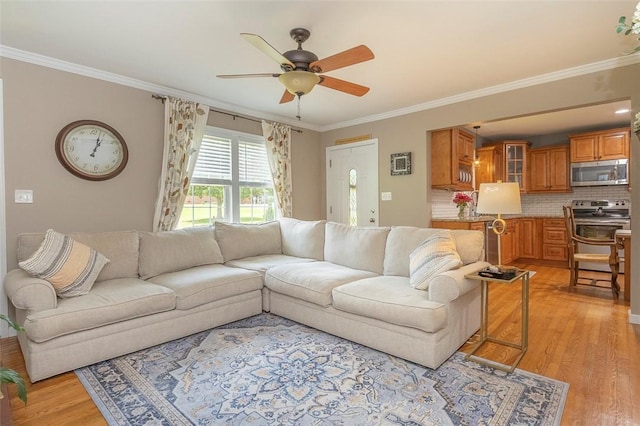 412 Singleton Rd, Anderson, SC 29625 - living area with crown molding, ceiling fan, and light wood-style floors