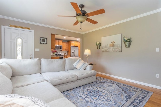 412 Singleton Rd, Anderson, SC 29625 - living area featuring crown molding, light wood finished floors, and ceiling fan