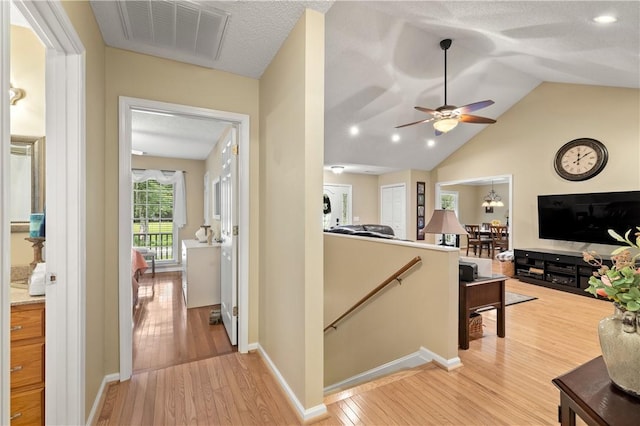 15067 Beacon Ridge Dr, Seneca, SC 29678 - corridor featuring an upstairs landing, light wood finished floors, and lofted ceiling