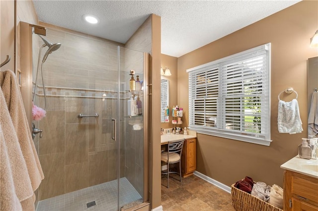 15067 Beacon Ridge Dr, Seneca, SC 29678 - bathroom with vanity, a stall shower, and a textured ceiling