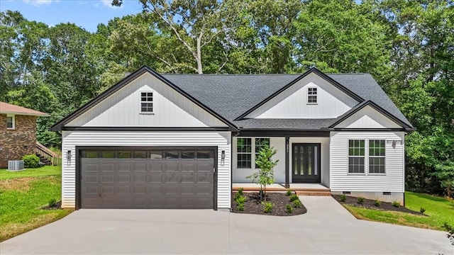 1205 Ramona Dr, Belton, SC 29627 - modern farmhouse with concrete driveway, a garage, a shingled roof, covered porch, and a front lawn