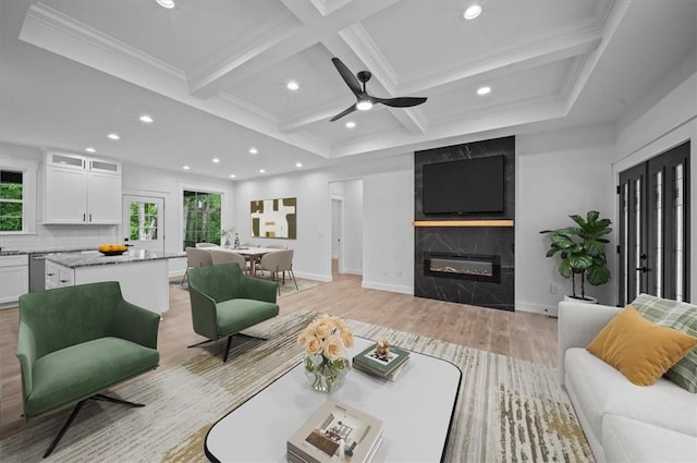 1205 Ramona Dr, Belton, SC 29627 - living room with light wood-style flooring, recessed lighting, a tiled fireplace, coffered ceiling, and beamed ceiling