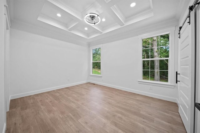 1205 Ramona Dr, Belton, SC 29627 - spare room with a barn door, coffered ceiling, beam ceiling, ornamental molding, and light wood finished floors