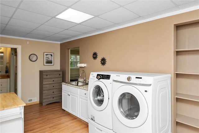 209 Falcon Crest Way, Pickens, SC 29671 - laundry area with washing machine and clothes dryer, light wood-style flooring, and crown molding