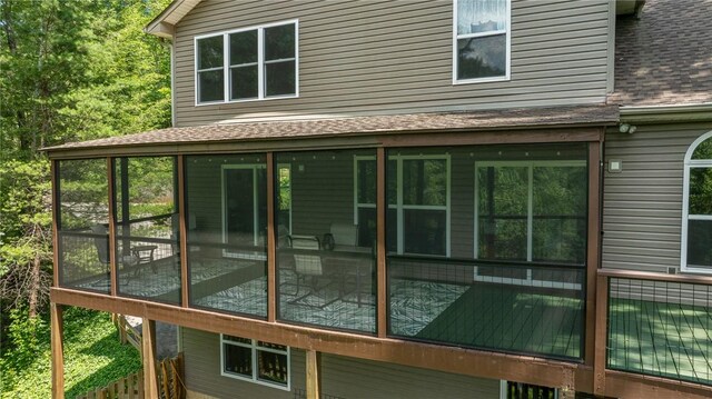 209 Falcon Crest Way, Pickens, SC 29671 - view of property exterior featuring roof with shingles and a sunroom