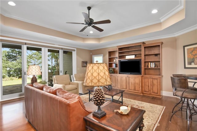 124 Pineridge Pointe Dr, Seneca, SC 29672 - living room with a raised ceiling, healthy amount of natural light, wood finished floors, ornamental molding, and recessed lighting