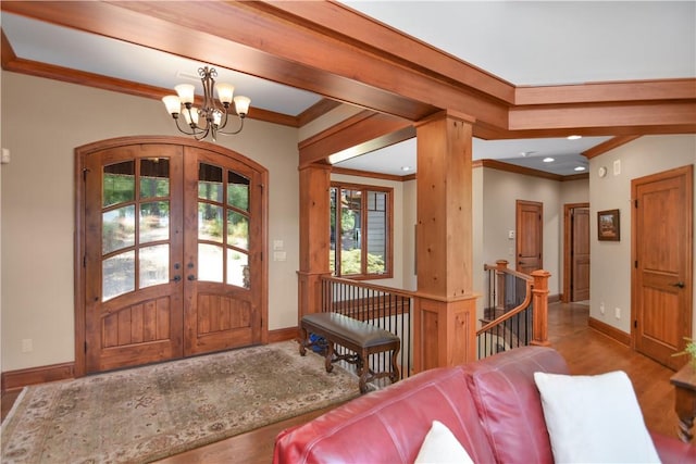 124 Pineridge Pointe Dr, Seneca, SC 29672 - entryway featuring ornamental molding, a chandelier, wood finished floors, and french doors