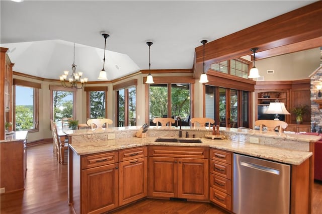 124 Pineridge Pointe Dr, Seneca, SC 29672 - kitchen featuring dishwasher, lofted ceiling, a chandelier, wood finished floors, and pendant lighting