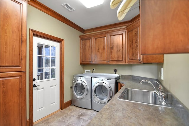 124 Pineridge Pointe Dr, Seneca, SC 29672 - washroom with washer and dryer, cabinet space, light tile patterned flooring, and crown molding