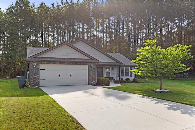 311 Buchanan Trl, Seneca, SC 29678 - view of front of home featuring a garage, driveway, a front yard, and stone siding