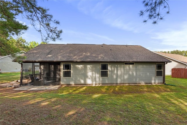 311 Buchanan Trl, Seneca, SC 29678 - back of house featuring a sunroom, a shingled roof, and a lawn