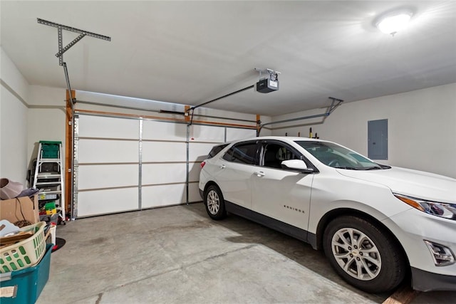 311 Buchanan Trl, Seneca, SC 29678 - garage featuring electric panel and a garage door opener