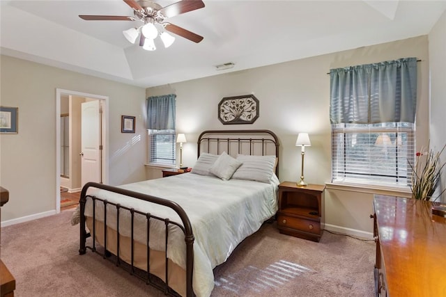 311 Buchanan Trl, Seneca, SC 29678 - bedroom featuring carpet flooring, a tray ceiling, and ceiling fan