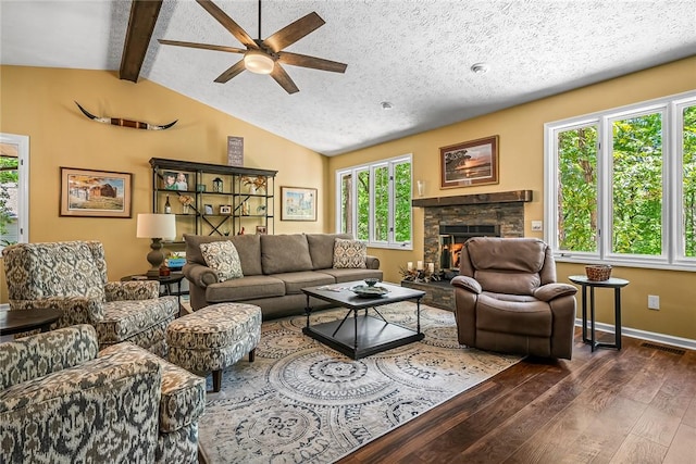 7 Drifter Ln, Salem, SC 29676 - living area featuring dark wood-style flooring, ceiling fan, a stone fireplace, and a textured ceiling
