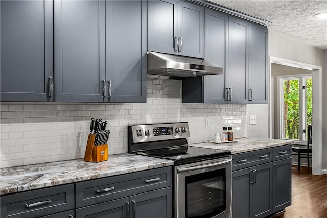 7 Drifter Ln, Salem, SC 29676 - kitchen featuring electric range, under cabinet range hood, a textured ceiling, dark wood-type flooring, and tasteful backsplash