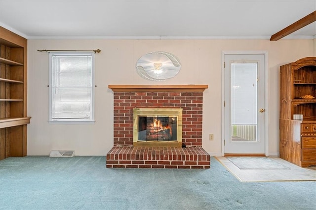 200 Camille St, Easley, SC 29642 - unfurnished living room with carpet flooring, a fireplace, and crown molding