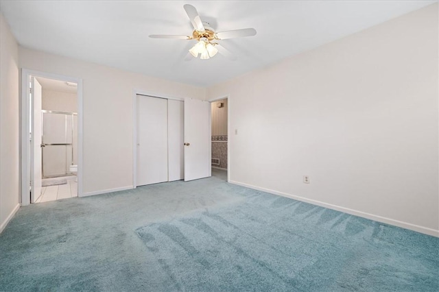 200 Camille St, Easley, SC 29642 - unfurnished bedroom featuring carpet flooring, connected bathroom, a closet, and ceiling fan