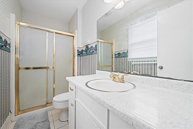 200 Camille St, Easley, SC 29642 - bathroom featuring wallpapered walls, a shower stall, vanity, and tile patterned flooring