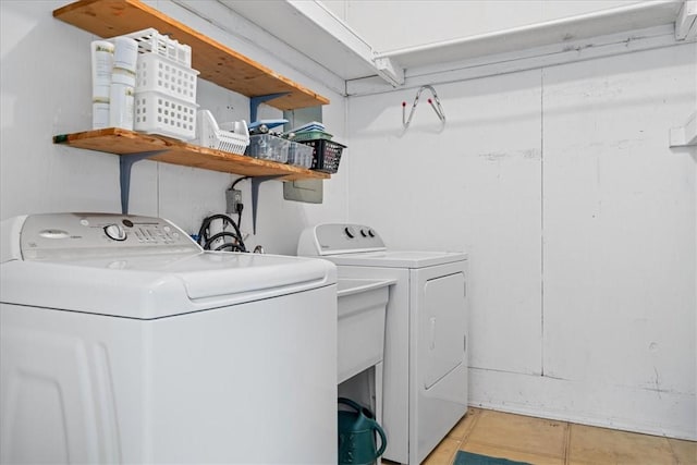 200 Camille St, Easley, SC 29642 - laundry area with independent washer and dryer and light tile patterned floors
