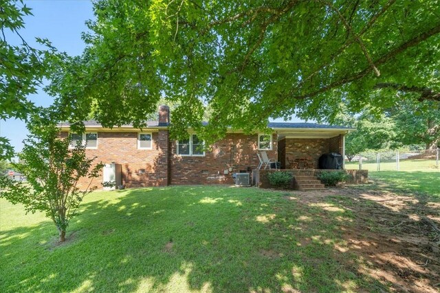 215 Ridgecrest Dr, Easley, SC 29640 - view of front facade featuring a chimney and brick siding