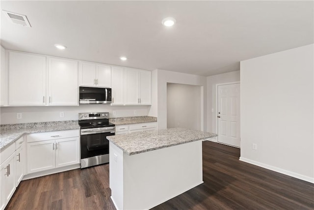 418 Kensington Cir Lot 19, Seneca, SC 29672 - kitchen featuring appliances with stainless steel finishes, a center island, dark wood-style flooring, white cabinets, and recessed lighting