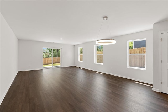 418 Kensington Cir Lot 19, Seneca, SC 29672 - empty room with plenty of natural light and dark wood-style floors