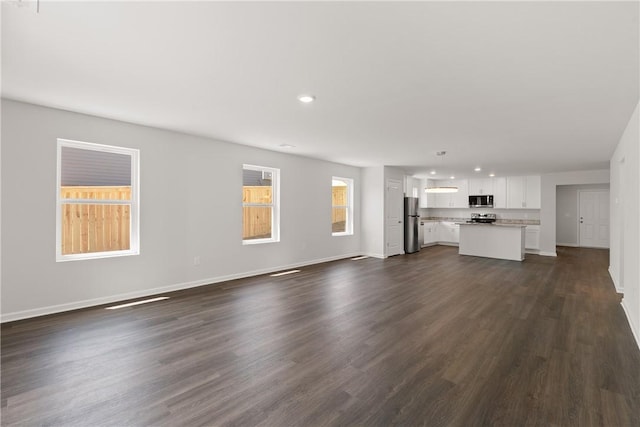 418 Kensington Cir Lot 19, Seneca, SC 29672 - unfurnished living room with dark wood-style flooring and recessed lighting