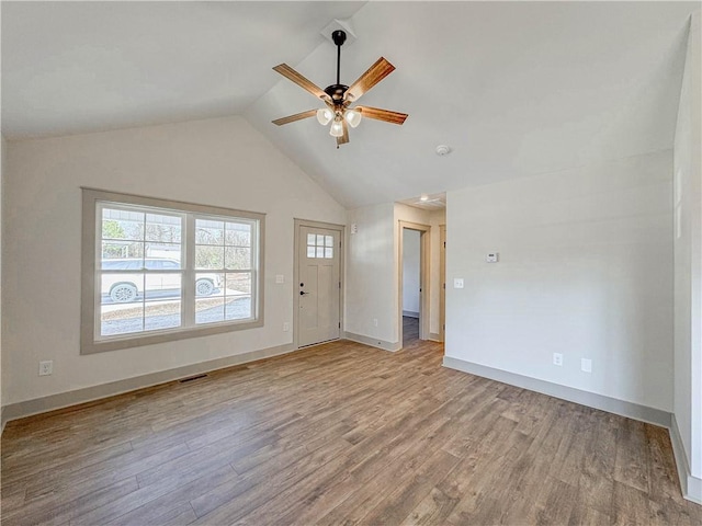 600 S Stribling St, Seneca, SC 29678 - unfurnished living room featuring lofted ceiling, ceiling fan, and light wood-type flooring