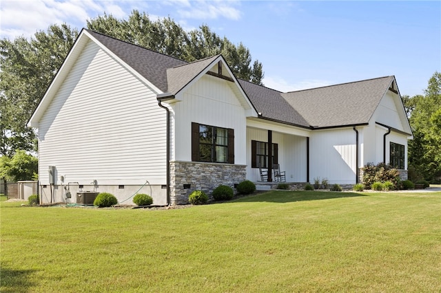 500 Serria Way, Seneca, SC 29678 - modern inspired farmhouse with a front yard, a shingled roof, a porch, and stone siding