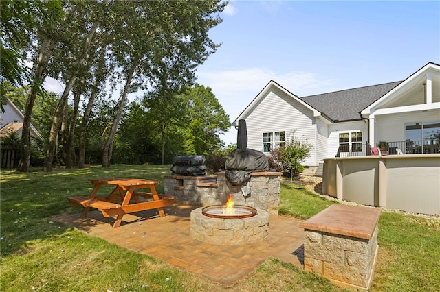 500 Serria Way, Seneca, SC 29678 - view of green lawn featuring a fire pit, a patio area, and a swimming pool