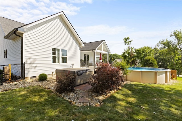 500 Serria Way, Seneca, SC 29678 - rear view of house featuring a hot tub, an outdoor pool, crawl space, and roof with shingles