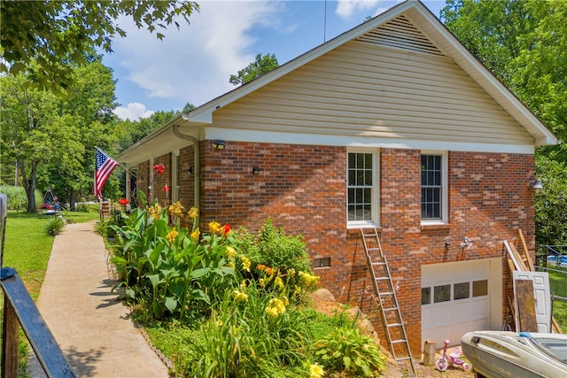 1399 Lake Jemiki Rd, Walhalla, SC 29691 - view of home's exterior featuring a garage and brick siding
