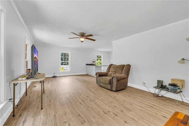 1399 Lake Jemiki Rd, Walhalla, SC 29691 - sitting room with crown molding, ceiling fan, and light wood-style flooring