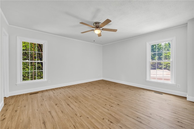 1399 Lake Jemiki Rd, Walhalla, SC 29691 - spare room with ornamental molding, light wood-style floors, and a ceiling fan