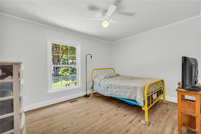1399 Lake Jemiki Rd, Walhalla, SC 29691 - bedroom featuring crown molding, wood finished floors, and a ceiling fan