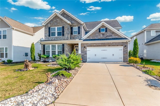 420 Merkel Dr, Greer, SC 29651 - craftsman-style home featuring stone siding, driveway, a front lawn, and an attached garage