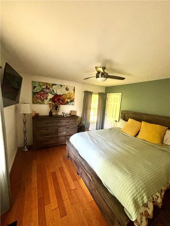 1430 W Main St, West Union, SC 29696 - bedroom with dark wood-type flooring and ceiling fan